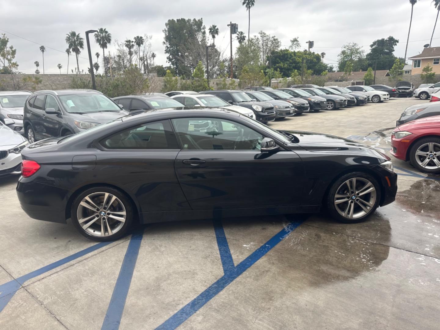 2015 Black BMW 4-Series 435i coupe (WBA3R1C55FK) with an 3.0L V6 DOHC 24V engine, 8-Speed Automatic transmission, located at 30 S. Berkeley Avenue, Pasadena, CA, 91107, (626) 248-7567, 34.145447, -118.109398 - Crown City Motors is a used “Buy Here Pay Here” car dealer in Pasadena CA. “Buy Here Pay Here” financing, means that when you purchase your vehicle from our dealership, that you make the payments to the dealership as well. We do not need the banks approval to get you approved for a used auto - Photo#5